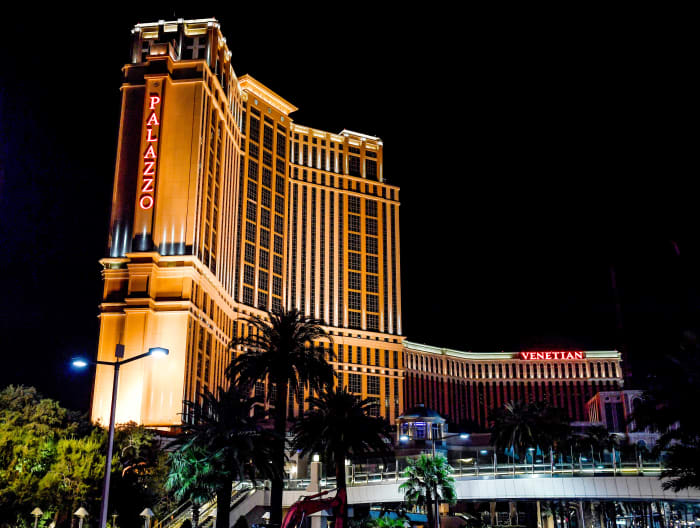 Sarah recounts drinks with Ronzone at the Venetian before walking to his room in the Palazzo to pick up tickets for a Summer League game.